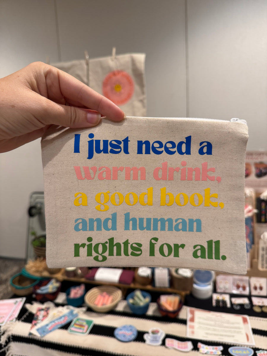 Warm Drink, Good Book, and Human Rights Zip Pouch