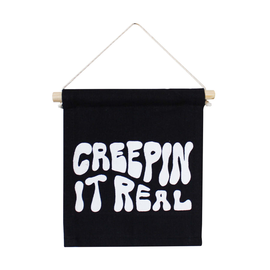 Creepin’ it real hang sign